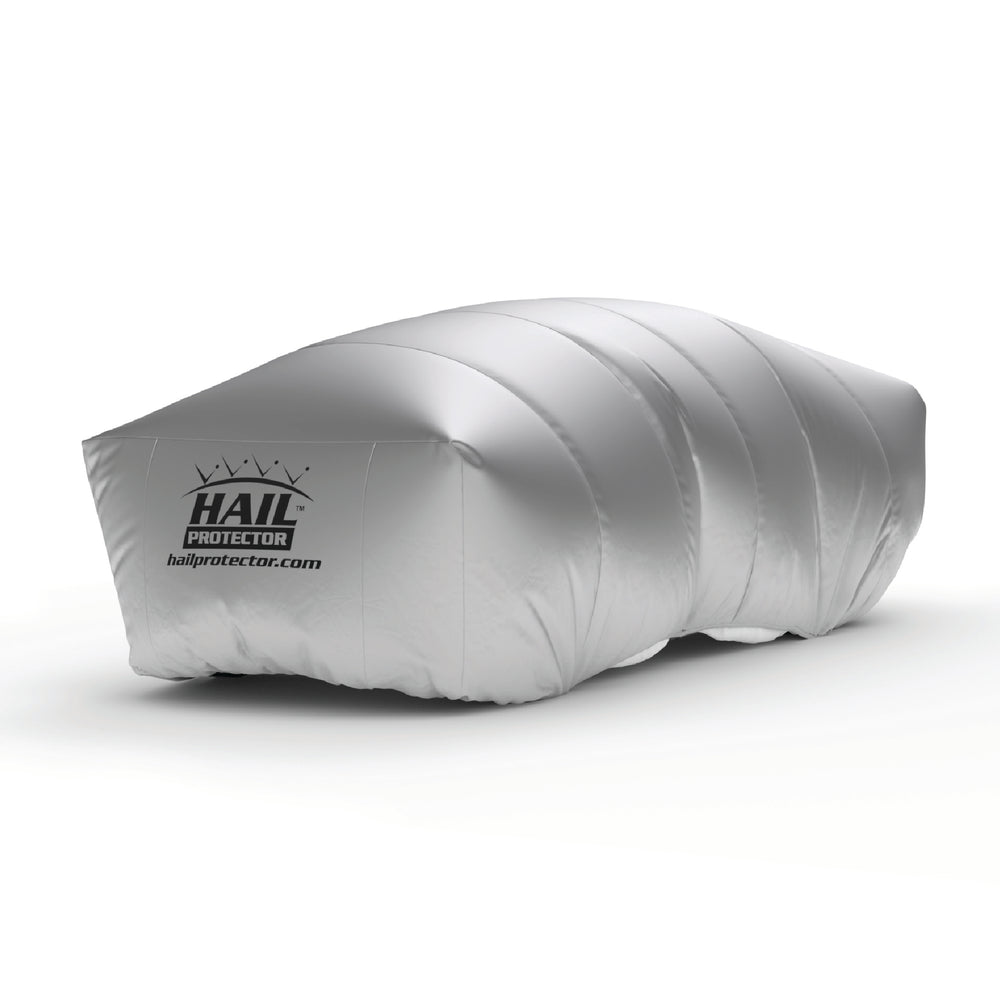 HailProtector inflatable hail cover fully deployed protecting a sedan from hailstorm damage