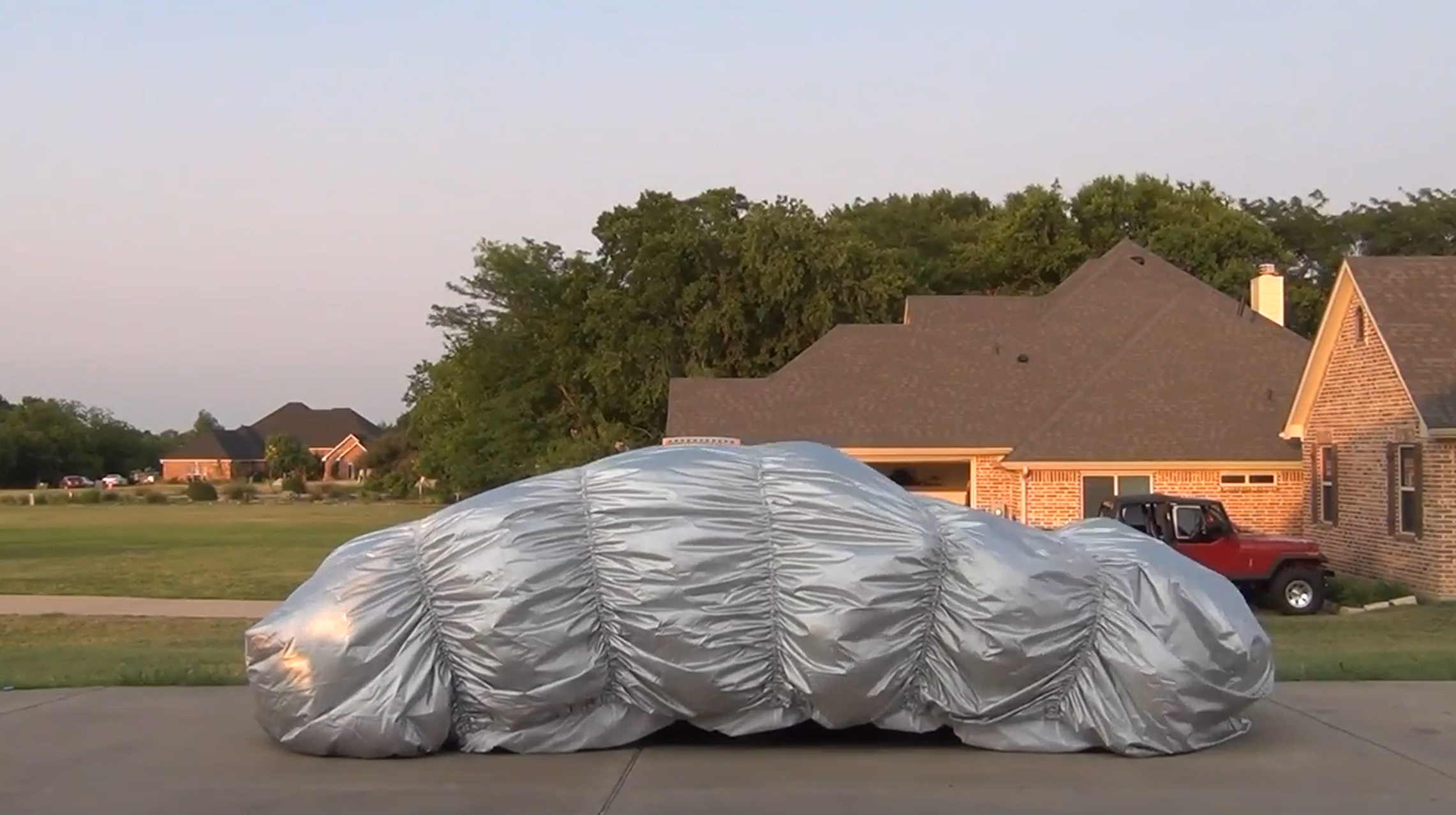 Dramatic hailstorm scene showing the real threat of hail damage to vehicles